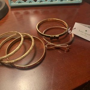 Set of brand name bangle bracelets